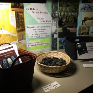 Up Wild Church information on a table